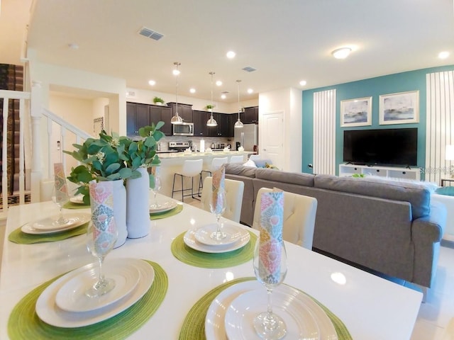 197 Jetty Way, Davenport, FL 33897 - dining area featuring stairway and recessed lighting