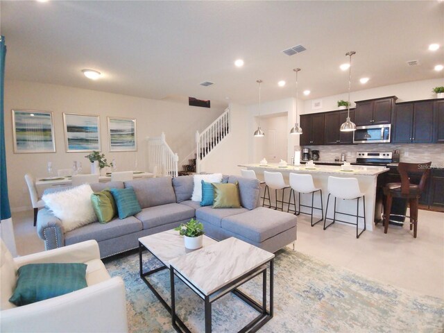 197 Jetty Way, Davenport, FL 33897 - living room with stairs and recessed lighting