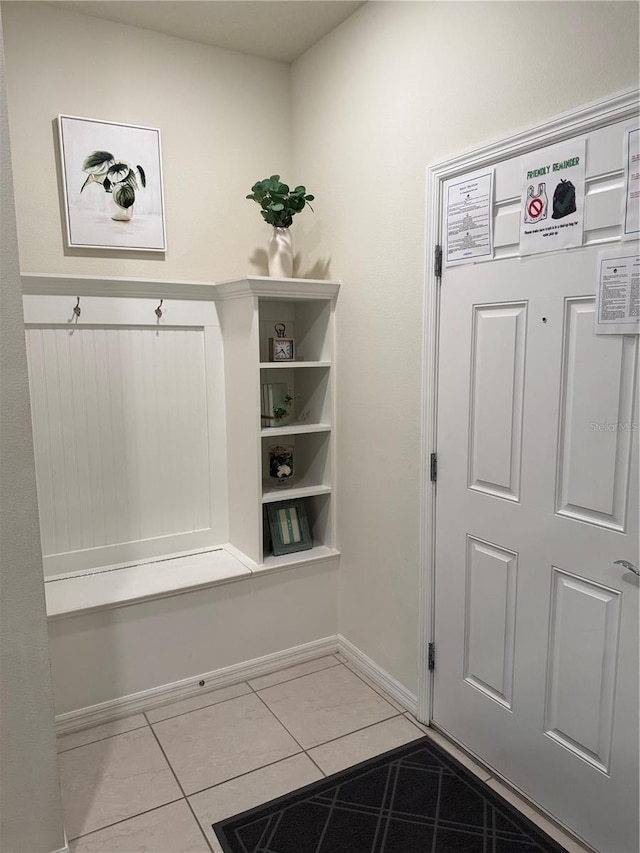 197 Jetty Way, Davenport, FL 33897 - mudroom featuring light tile patterned flooring and baseboards