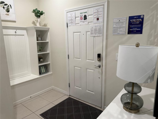 197 Jetty Way, Davenport, FL 33897 - mudroom featuring tile patterned flooring and baseboards