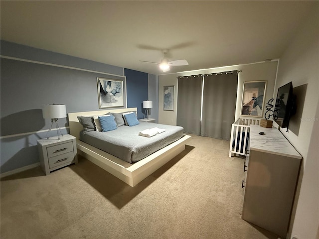 197 Jetty Way, Davenport, FL 33897 - bedroom with light colored carpet and a ceiling fan