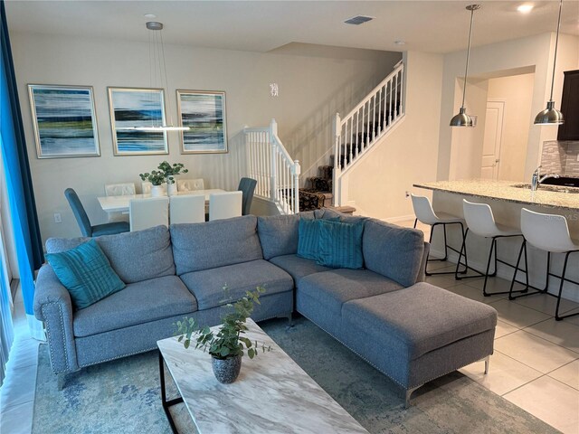 197 Jetty Way, Davenport, FL 33897 - living room with stairs and light tile patterned flooring