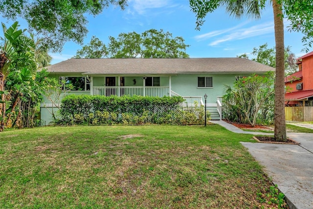 9503 Alice Ln, Riverview, FL 33578 - ranch-style house featuring a front yard, covered porch, and stucco siding