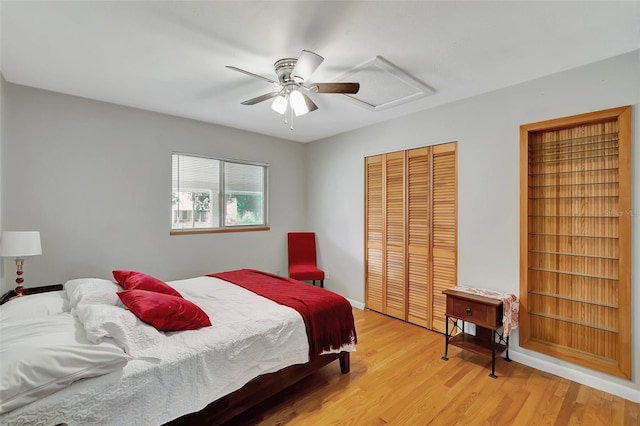 9503 Alice Ln, Riverview, FL 33578 - bedroom featuring a closet, light wood-style flooring, and a ceiling fan