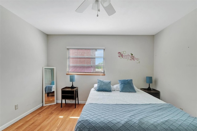 9503 Alice Ln, Riverview, FL 33578 - bedroom with wood finished floors and a ceiling fan