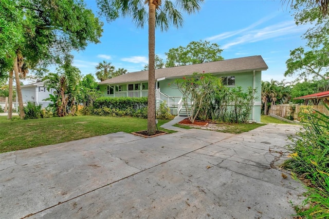 9503 Alice Ln, Riverview, FL 33578 - view of front of home with stucco siding and a patio area