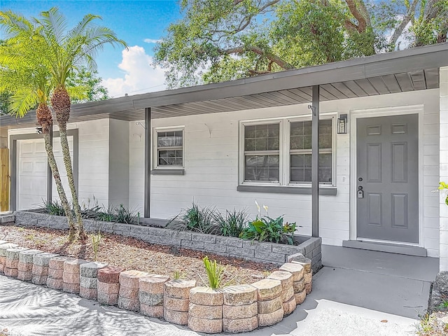1298 Scottsdale Dr, Ormond Beach, FL 32174 - entrance to property featuring an attached garage