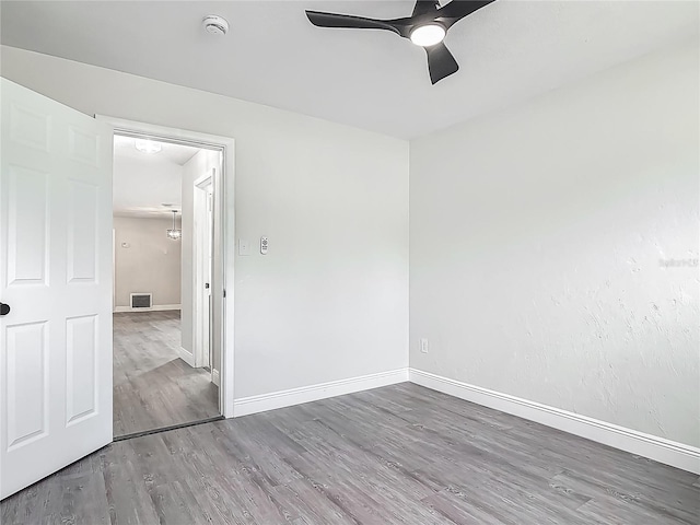 1298 Scottsdale Dr, Ormond Beach, FL 32174 - unfurnished room featuring baseboards, ceiling fan, visible vents, and wood finished floors