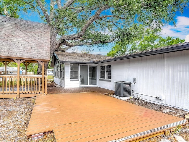 1298 Scottsdale Dr, Ormond Beach, FL 32174 - wooden deck with central AC unit