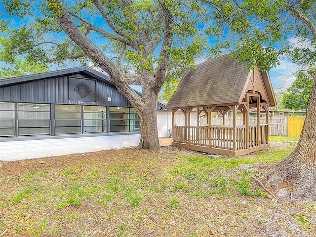1298 Scottsdale Dr, Ormond Beach, FL 32174 - rear view of house featuring fence