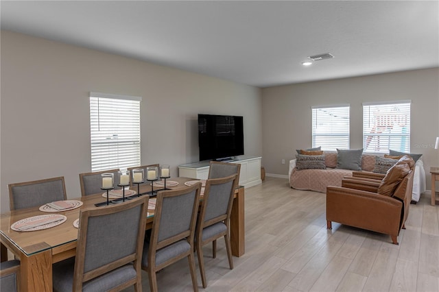 dining area with visible vents, recessed lighting, baseboards, and light wood-type flooring