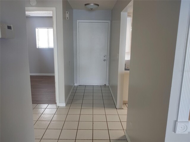 4109 Fairview Vista Pt Unit 315, Orlando, FL 32804 - corridor with baseboards and light tile patterned flooring