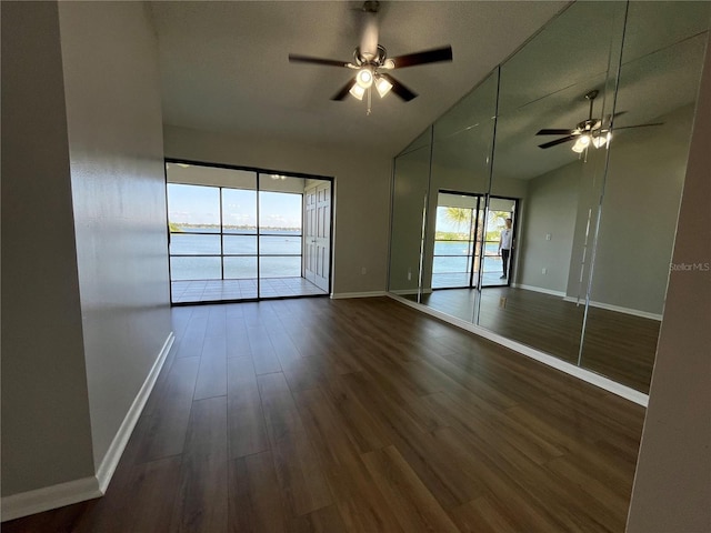 4109 Fairview Vista Pt Unit 315, Orlando, FL 32804 - unfurnished room with vaulted ceiling, baseboards, and a ceiling fan