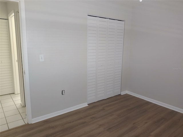 4109 Fairview Vista Pt Unit 315, Orlando, FL 32804 - empty room featuring baseboards and wood finished floors