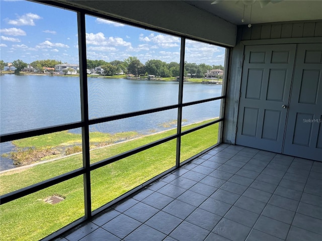 4109 Fairview Vista Pt Unit 315, Orlando, FL 32804 - unfurnished sunroom featuring a water view