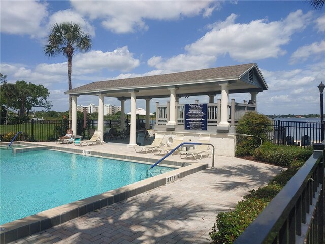 4109 Fairview Vista Pt Unit 315, Orlando, FL 32804 - community pool with a gazebo, fence, and a patio area
