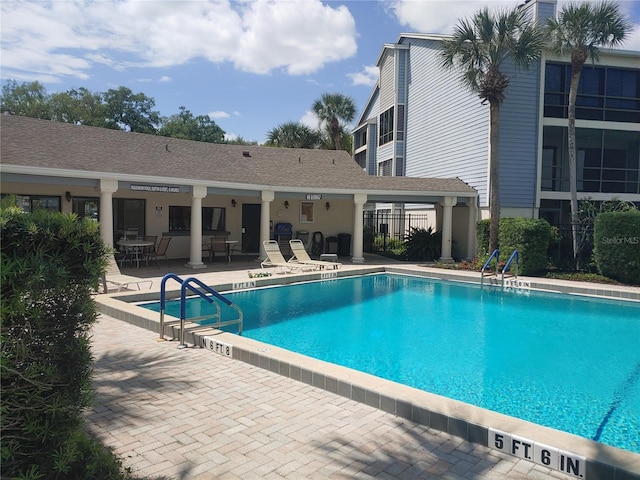 4109 Fairview Vista Pt Unit 315, Orlando, FL 32804 - pool with fence and a patio area