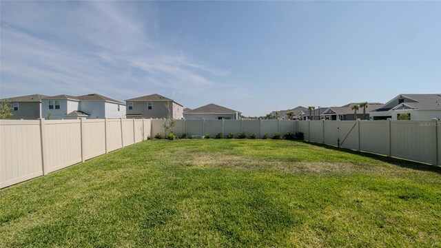 view of yard with a residential view