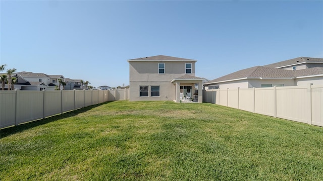 back of property featuring stucco siding