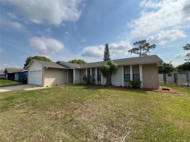 909 Royalton Rd, Orlando, FL 32825 - single story home featuring an attached garage, driveway, and stucco siding