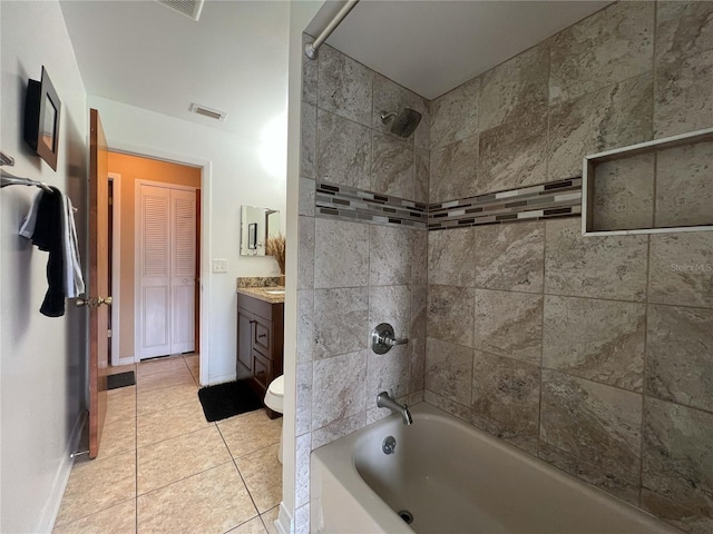 909 Royalton Rd, Orlando, FL 32825 - full bathroom featuring shower / tub combination, tile patterned flooring, vanity, toilet, and baseboards