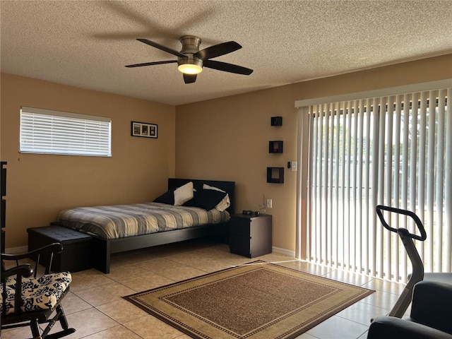 909 Royalton Rd, Orlando, FL 32825 - tiled bedroom with a textured ceiling and ceiling fan