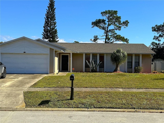 909 Royalton Rd, Orlando, FL 32825 - ranch-style home with an attached garage, concrete driveway, a front lawn, and stucco siding