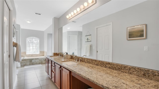 726 Lake Biscayne Way, Orlando, FL 32824 - full bathroom featuring tile patterned floors, a garden tub, and double vanity
