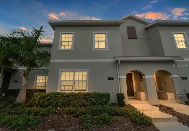 4983 Windermere Ave, Kissimmee, FL 34746 - view of front of home with stucco siding