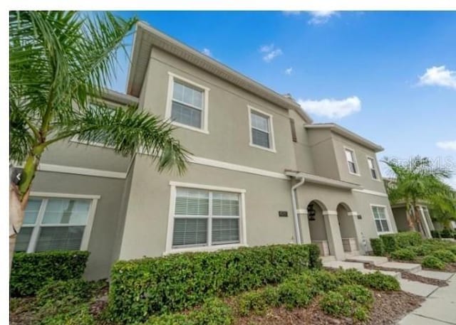 4983 Windermere Ave, Kissimmee, FL 34746 - view of front facade with stucco siding
