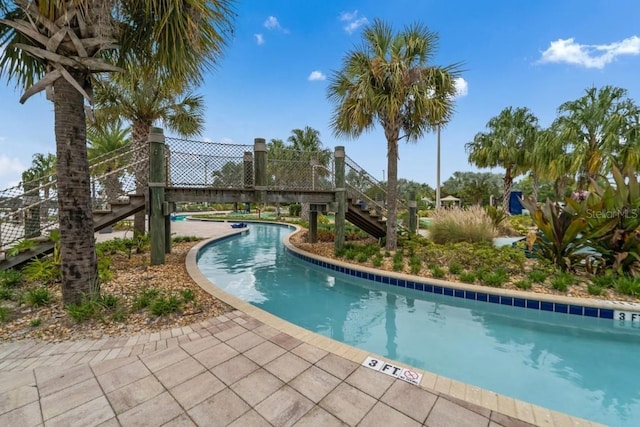 4983 Windermere Ave, Kissimmee, FL 34746 - community pool featuring stairway