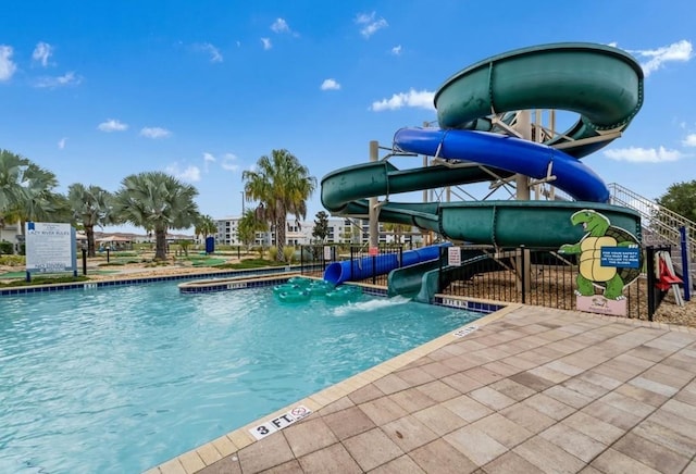 4983 Windermere Ave, Kissimmee, FL 34746 - community pool featuring a water slide