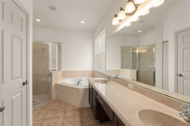 full bathroom with a bath, a stall shower, tile patterned flooring, and recessed lighting