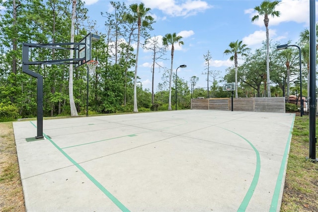 view of sport court with community basketball court and fence