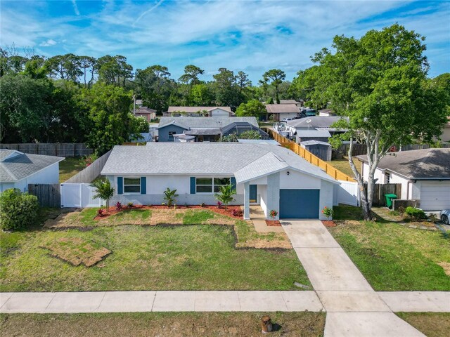 single story home with a garage, a gate, stucco siding, and concrete driveway