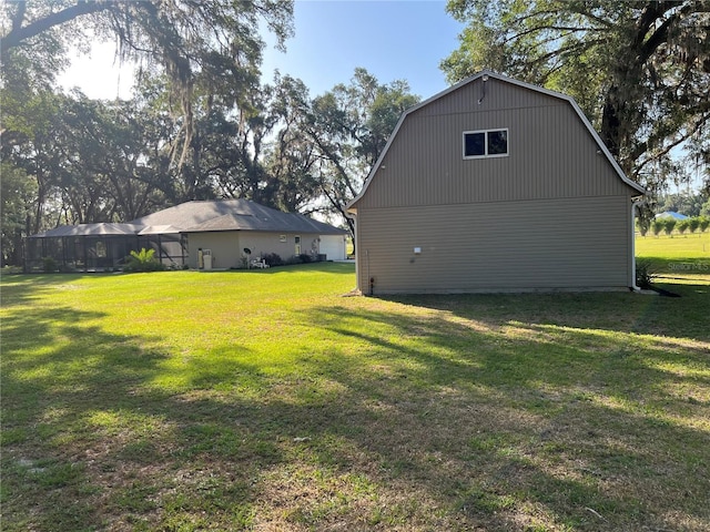 exterior space featuring a barn and an outbuilding