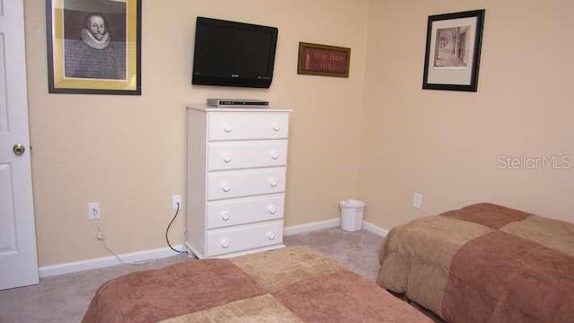 bedroom with baseboards
