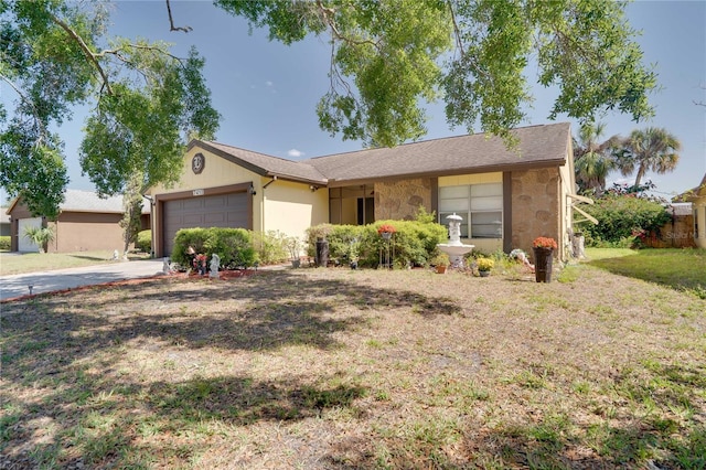 7418 Riverbank Dr, New Port Richey, FL 34655 - ranch-style house featuring a garage, driveway, and a front yard