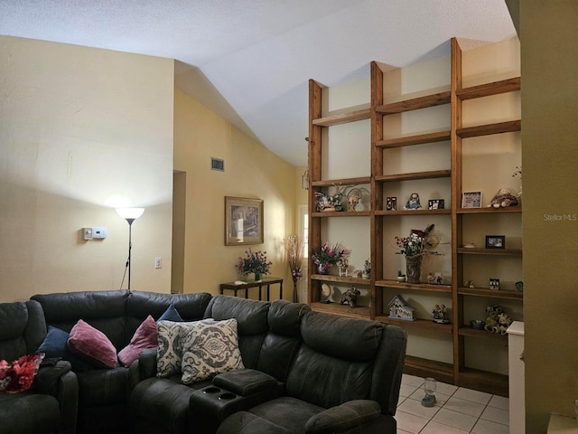 7418 Riverbank Dr, New Port Richey, FL 34655 - living area featuring light tile patterned floors and high vaulted ceiling