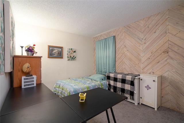 7418 Riverbank Dr, New Port Richey, FL 34655 - bedroom with carpet flooring and a textured ceiling