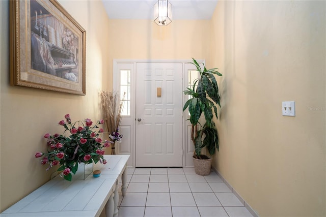 7418 Riverbank Dr, New Port Richey, FL 34655 - entrance foyer with light tile patterned floors