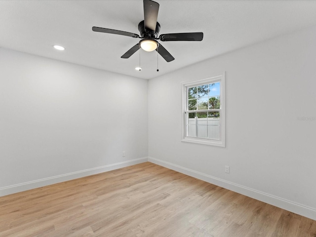 2205 Pine Island Dr, New Smyrna Beach, FL 32168 - unfurnished room with baseboards, light wood-style flooring, recessed lighting, and a ceiling fan