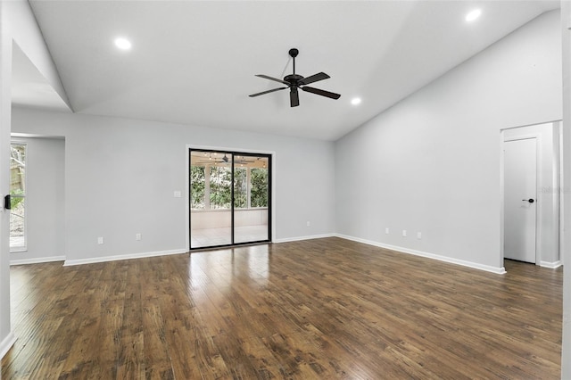 spare room featuring recessed lighting, vaulted ceiling, a ceiling fan, and dark wood-style floors