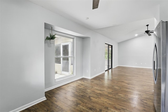 unfurnished room featuring baseboards, a ceiling fan, hardwood / wood-style floors, and lofted ceiling