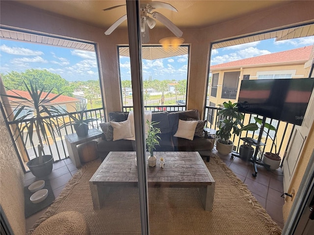 4333 Bayside Village Dr Unit 310, Tampa, FL 33615 - sunroom with tile patterned flooring and a ceiling fan