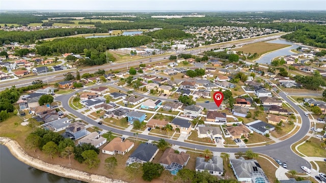 5113 Sage Way, Kissimmee, FL 34758 - aerial view of property and surrounding area featuring a large body of water and nearby suburban area