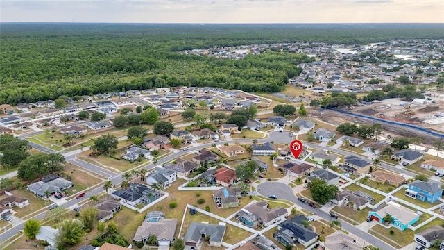 5113 Sage Way, Kissimmee, FL 34758 - aerial overview of property's location featuring a heavily wooded area and nearby suburban area