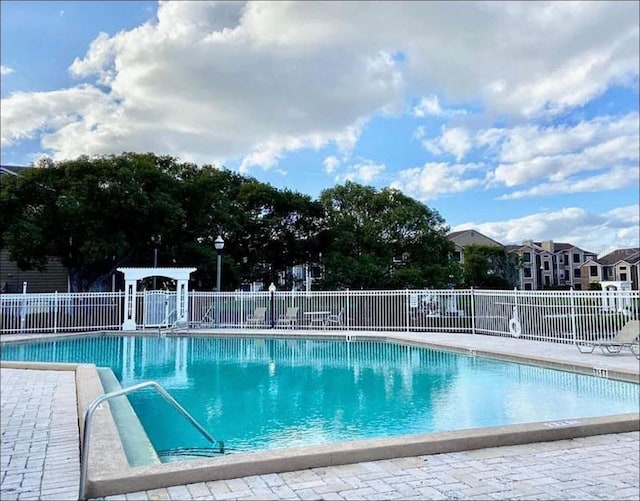 pool featuring fence