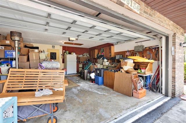 garage featuring freestanding refrigerator