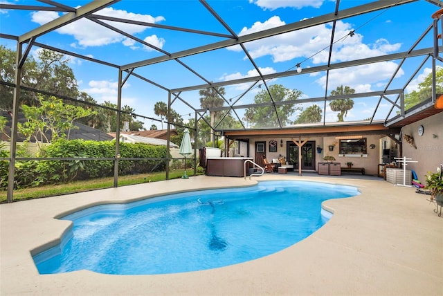outdoor pool featuring an outdoor hangout area, glass enclosure, and a patio